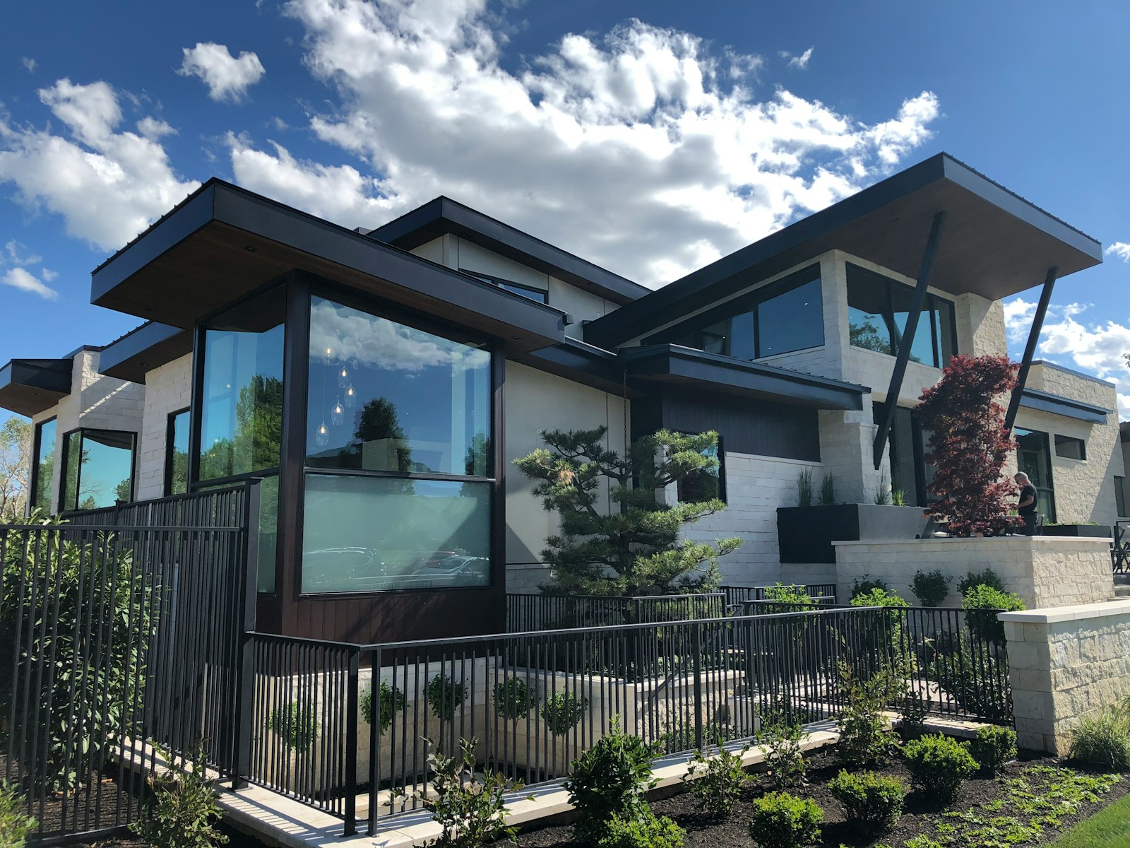 white and brown wooden house under blue sky during daytime high-value home